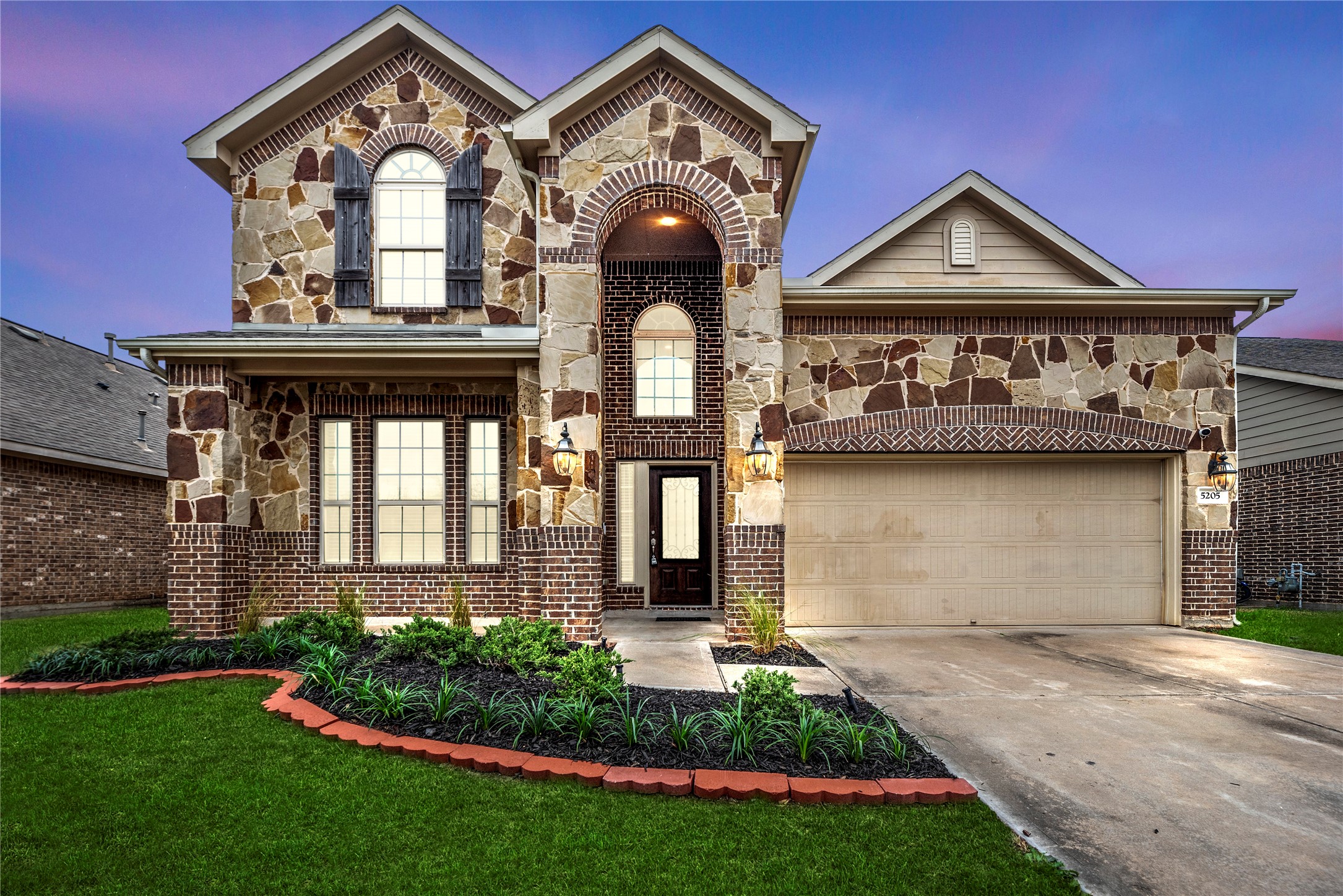 5205 Rainy Garden Court Rosharon, TX 77583 - Photo 40 of 43 a front view of a house with garden