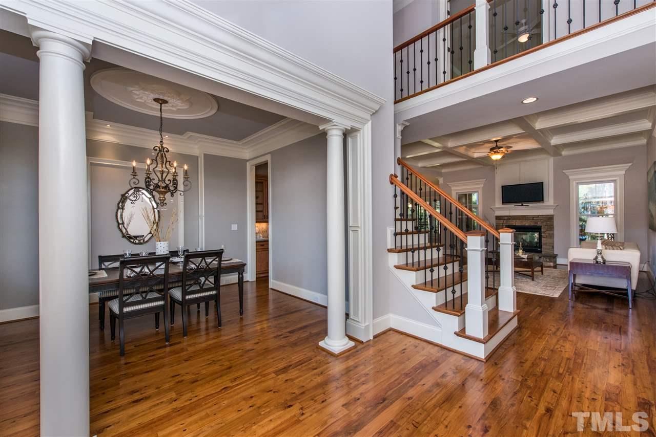 3003 Greyhawk Place Apex, NC 27539 - Photo 3 of 25 a view of a livingroom with furniture and wooden floor