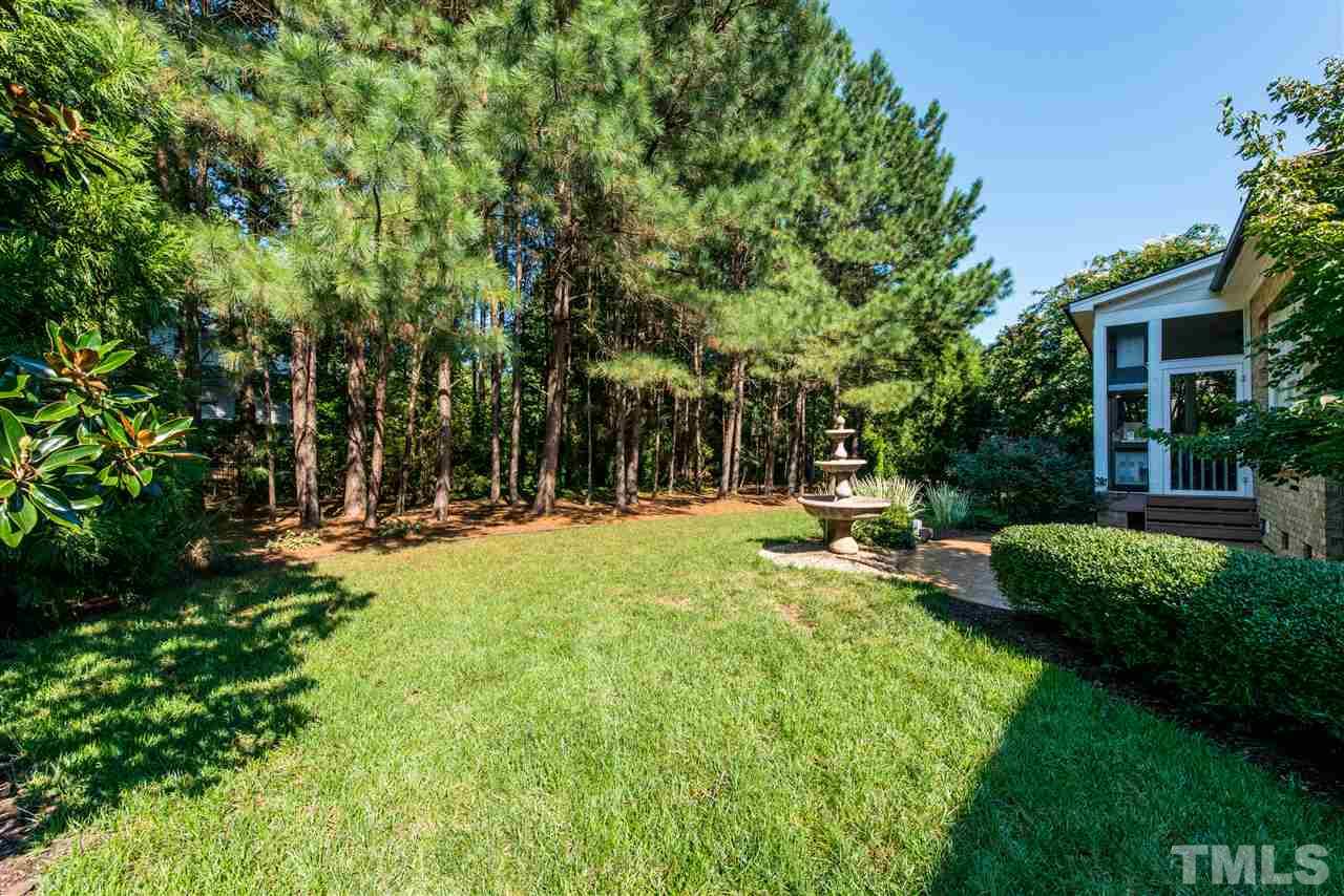 3003 Greyhawk Place Apex, NC 27539 - Photo 23 of 25 a view of a park with large trees