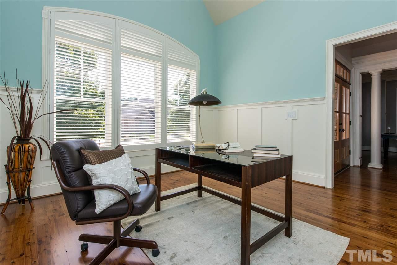 3003 Greyhawk Place Apex, NC 27539 - Photo 4 of 25 a room with furniture and a window