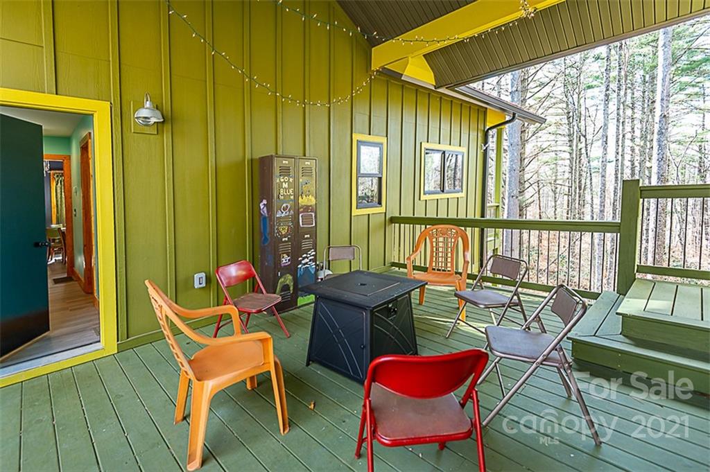 241 Ray Hill Road Horse Shoe, NC 28742 - Photo 31 of 43 a view of a chairs and table in the balcony