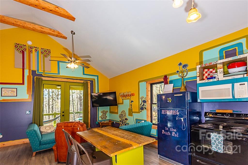 241 Ray Hill Road Horse Shoe, NC 28742 - Photo 33 of 43 a view of a chairs and table in a patio