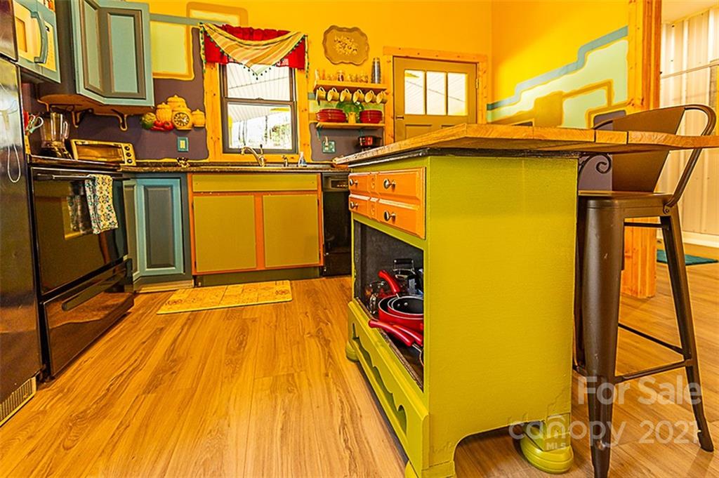 241 Ray Hill Road Horse Shoe, NC 28742 - Photo 34 of 43 a view of an chairs in the balcony