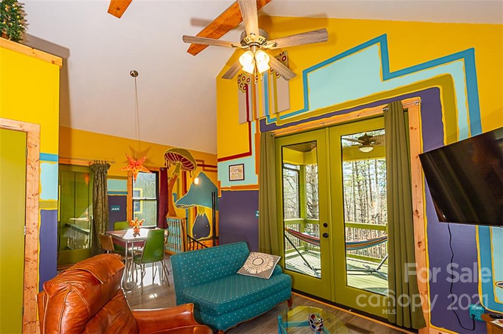 241 Ray Hill Road Horse Shoe, NC 28742 - Photo 35 of 43 a view of a chairs and a table in the patio