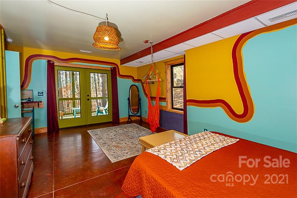 241 Ray Hill Road Horse Shoe, NC 28742 - Photo 40 of 43 a view of a swimming pool with a table and chairs