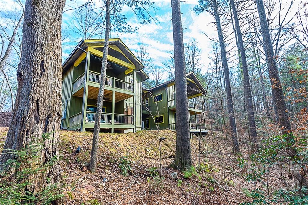 241 Ray Hill Road Horse Shoe, NC 28742 - Photo 4 of 43 a front view of a house with a yard