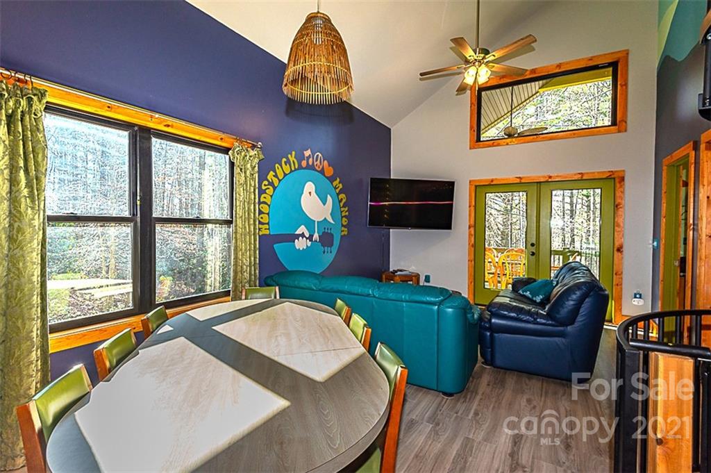 241 Ray Hill Road Horse Shoe, NC 28742 - Photo 9 of 43 a living room with furniture and a large window