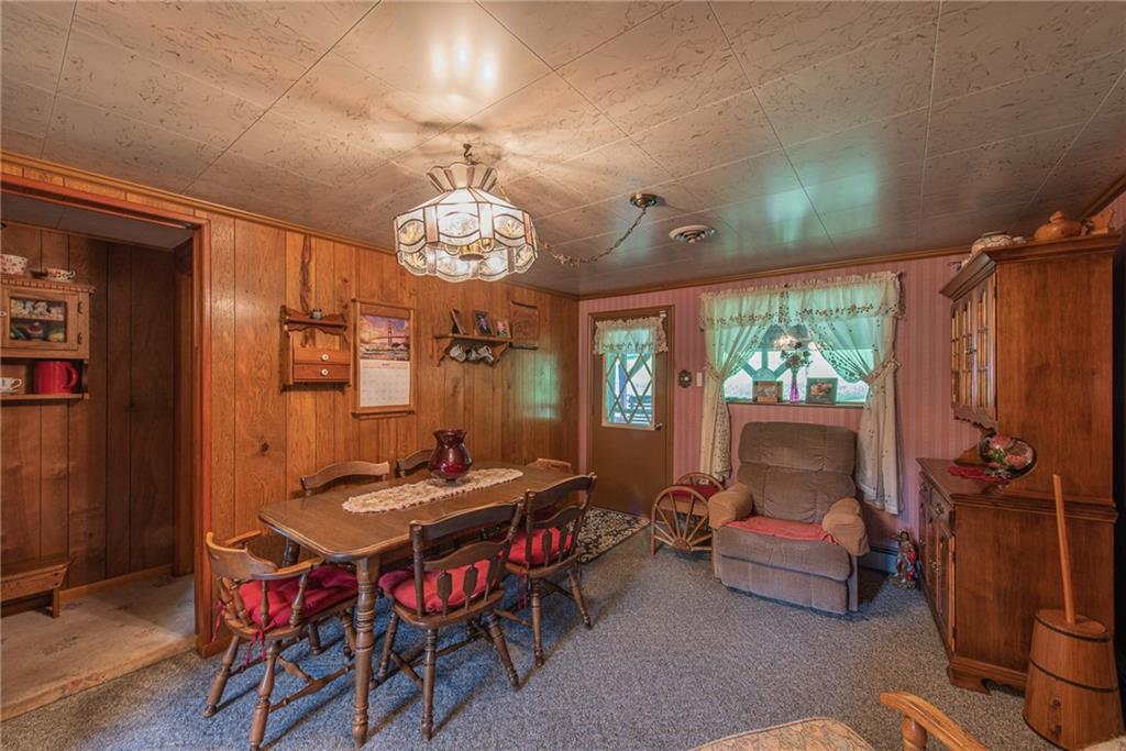 532 Spruce Hollow Road Vandergrift, PA 15690 - Photo 5 of 47 a outdoor dining room with furniture a chandelier and window