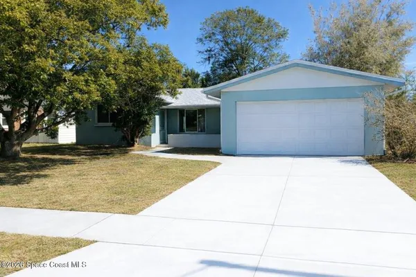 a house view with a outdoor space