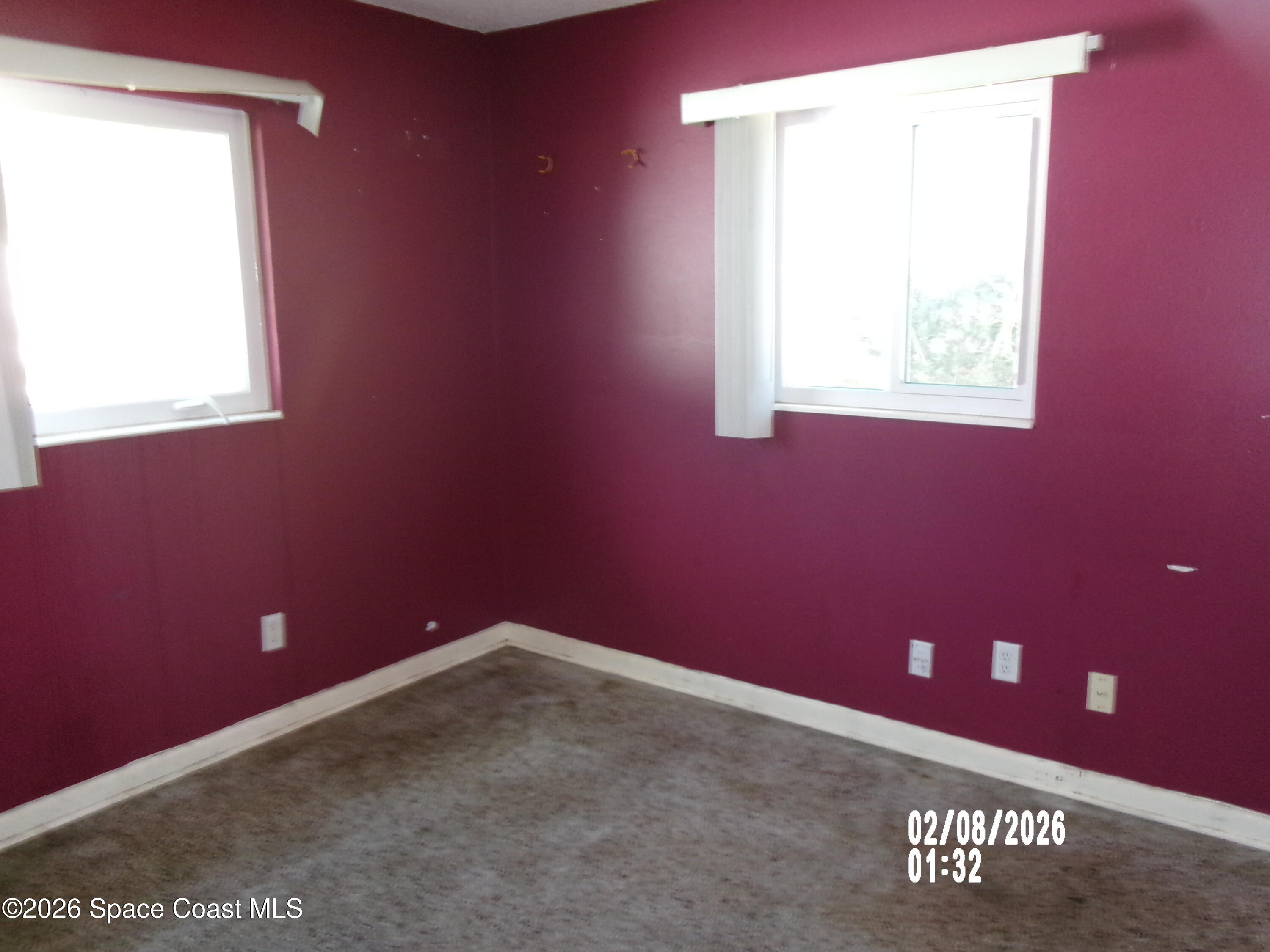 1336 Estridge Drive Rockledge, FL 32955 - Photo 6 of 11 a view of an empty room with a window