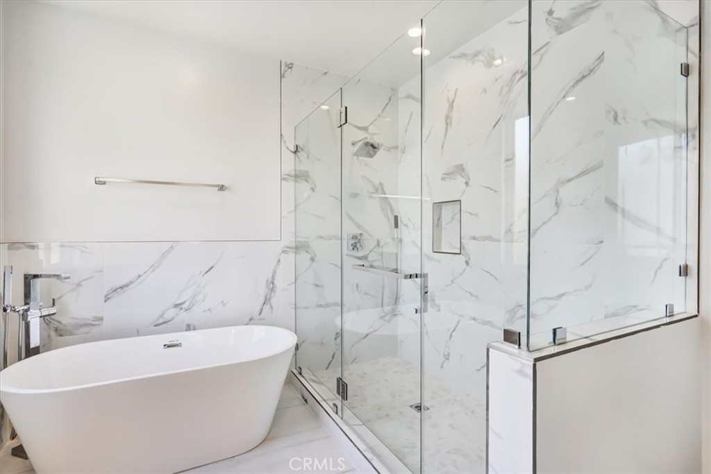1908 Perry Avenue, Unit B Redondo Beach, CA 90278 - Photo 19 of 20 a white bath tub sitting next to a shower