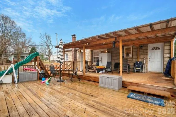 a backyard of a house with seating space