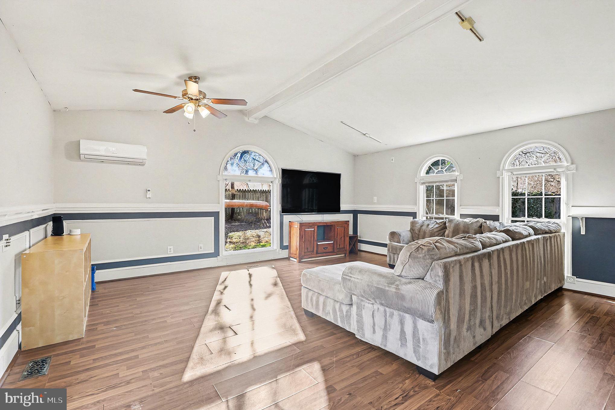 5822 Jackson Road Fredericksburg, VA 22407 - Photo 12 of 26 a living room with furniture and a flat screen tv