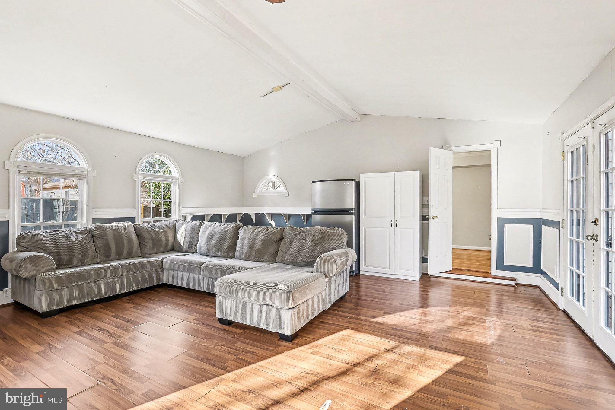 5822 Jackson Road Fredericksburg, VA 22407 - Photo 13 of 26 a living room with furniture and a wooden floor