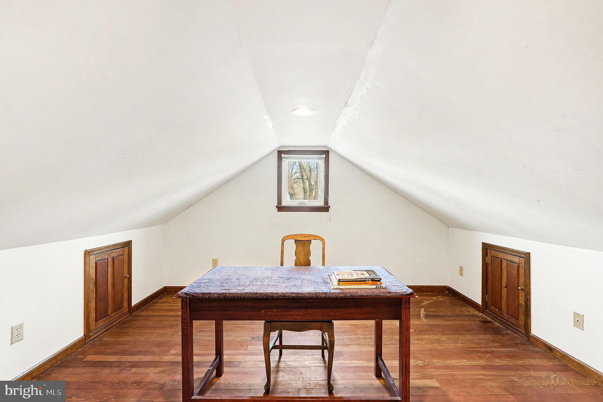5822 Jackson Road Fredericksburg, VA 22407 - Photo 22 of 26 a view of a workspace with furniture and wooden floor