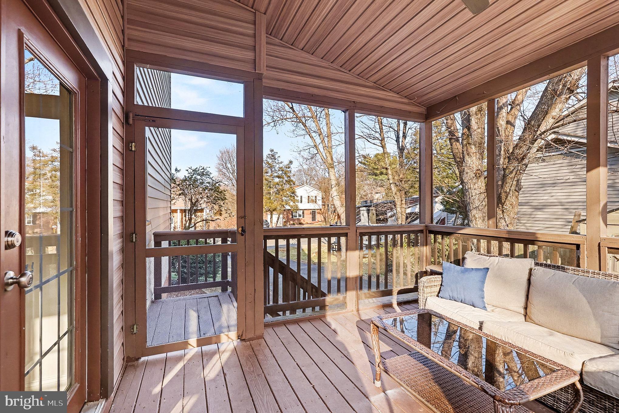 5822 Jackson Road Fredericksburg, VA 22407 - Photo 25 of 26 a view of a balcony with furniture and wooden floor