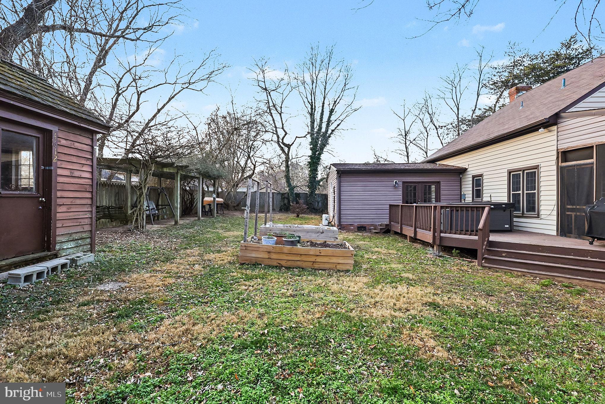 5822 Jackson Road Fredericksburg, VA 22407 - Photo 26 of 26 a view of a house with backyard and chairs