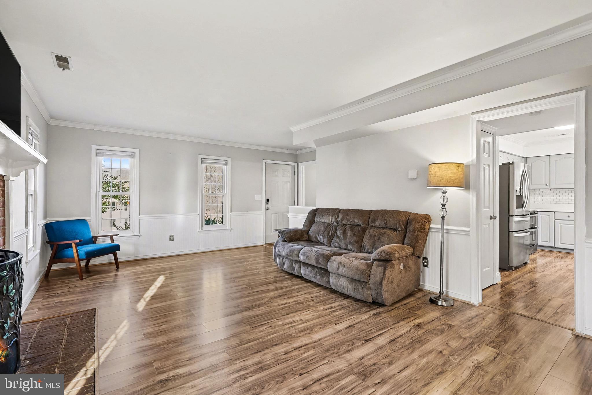 5822 Jackson Road Fredericksburg, VA 22407 - Photo 3 of 26 a living room with furniture and a flat screen tv