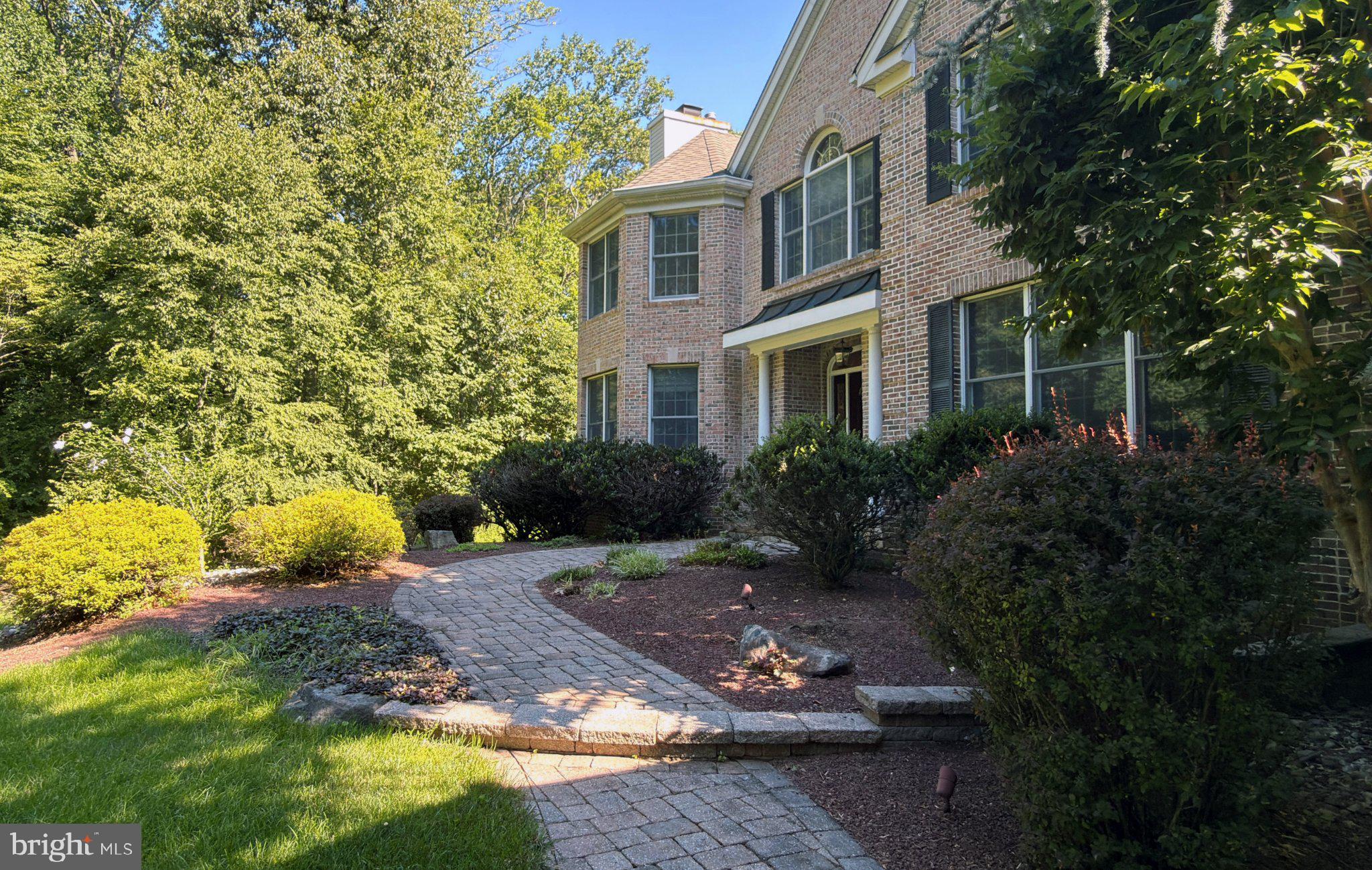 172 Mountain Road Ringoes, NJ 08551 - Photo 5 of 60 Charming brick home with lush landscaping.