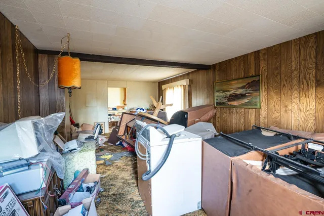 a kitchen with a sink stove and white cabinets
