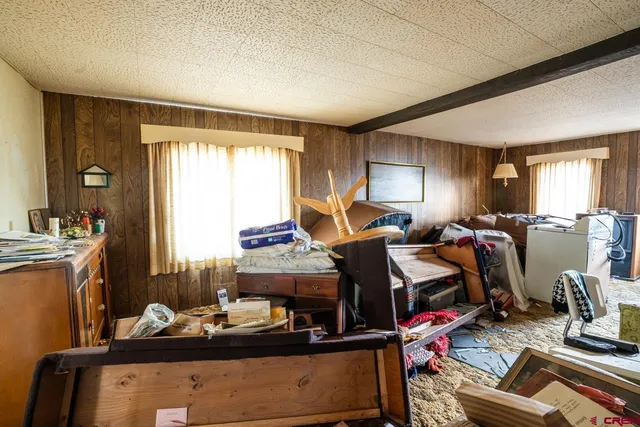 a bathroom with a sink mirror vanity and window