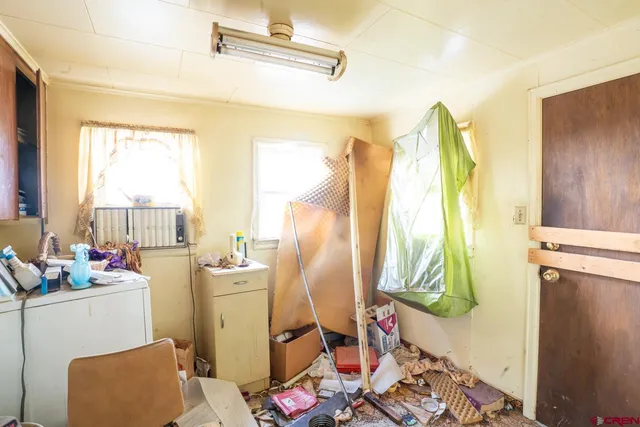 a view of a kitchen and a sink