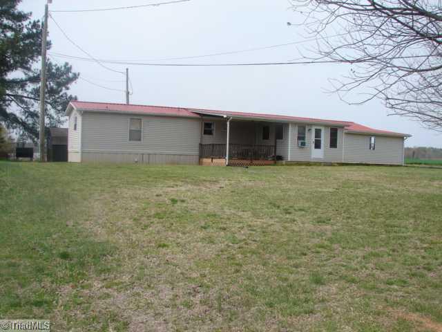 1785 Riverview Rdl Extension Lexington, NC 27292 - Photo 1 of 12 Exterior Front. Notice the singlewide garage at the right side.