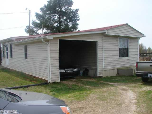 1785 Riverview Rdl Extension Lexington, NC 27292 - Photo 9 of 12 Exterior Front. view of single car carport.