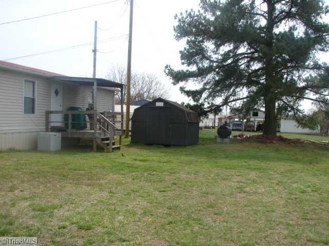 1785 Riverview Rdl Extension Lexington, NC 27292 - Photo 10 of 12 View. view of the back and storage building.
