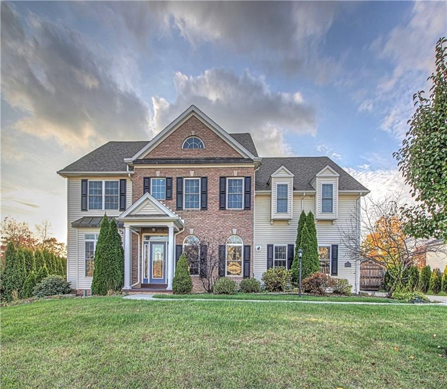 129 Chestnut Ridge Drive Beaver Falls, PA 15010 - Photo 1 of 25 Appealing brick/vinyl custom built home on a premium 1.06 acre lot in Shenango Woods. A lush, manicured lawn with mature landscaping completes the package