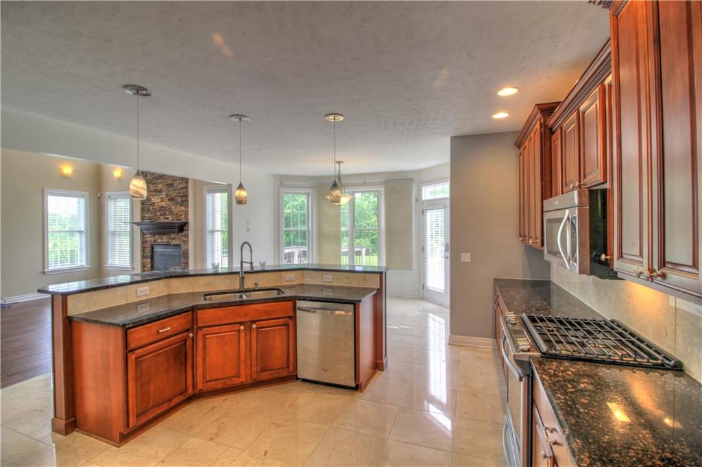 129 Chestnut Ridge Drive Beaver Falls, PA 15010 - Photo 11 of 25 The kitchen island strategically placed to allow conversation and comarderie to flow as you prep your meals and enjoy the outdoor view!