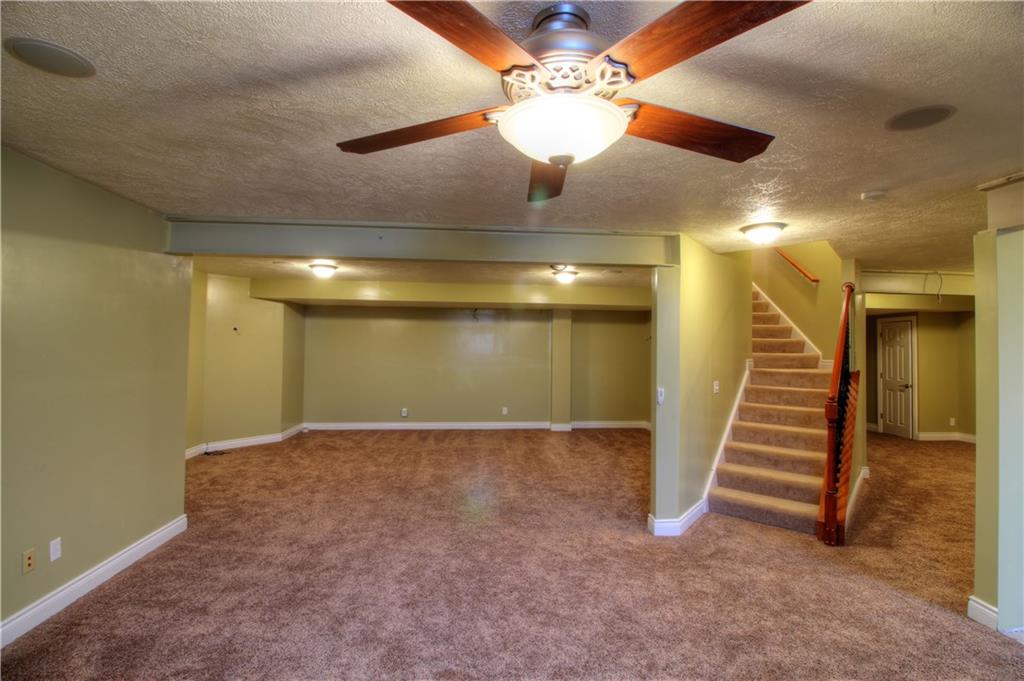 129 Chestnut Ridge Drive Beaver Falls, PA 15010 - Photo 16 of 25 View from the Game Room/Lounge to Media Room that's ready for your equipment! At right you will find an additional room that could make an ideal In-Law Suite or 5th Bedroom off the Full Bath!