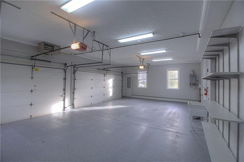 129 Chestnut Ridge Drive Beaver Falls, PA 15010 - Photo 25 of 25 Auxiliary heat, abundant lighting, shelves for storage, On-Demand Water Heater, slop sink! It is ready for you!