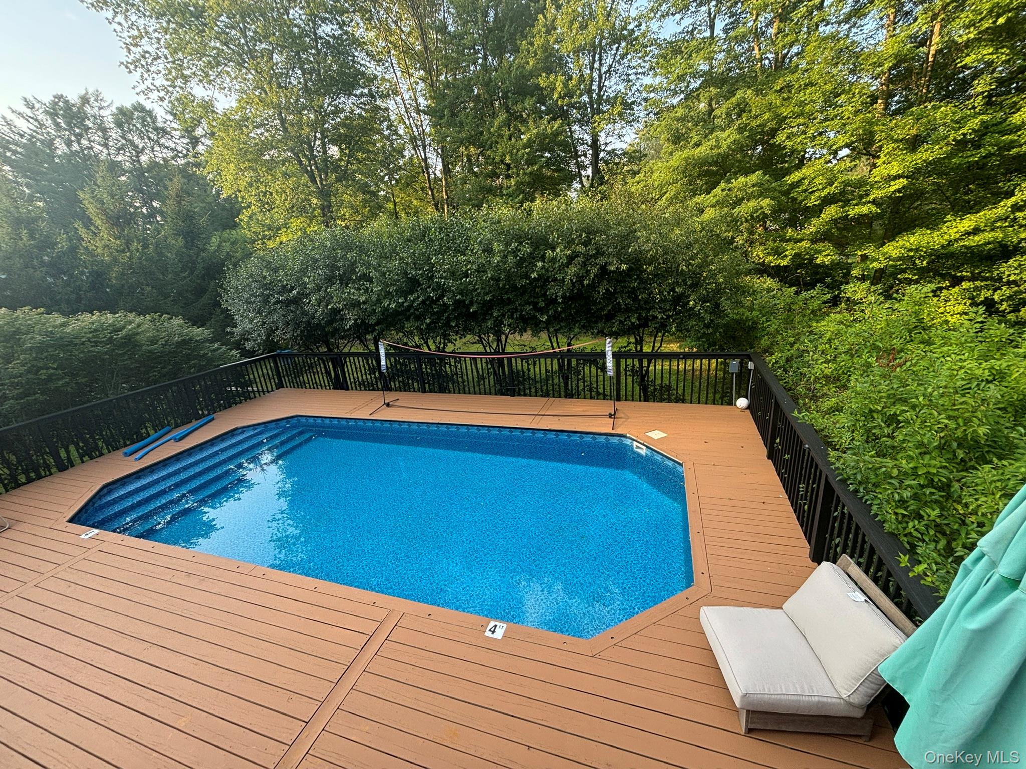 25 Pinebrook Loop Hopewell Junction, NY 12533 - Photo 4 of 4 a view of a swimming pool with a patio