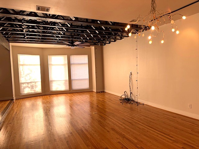 4243 Purdue Street, Unit C Houston, TX 77005 - Photo 21 of 48 a view of a room with wooden floor and window