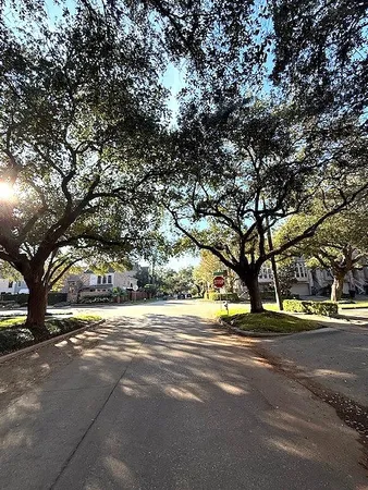 a view of road with trees