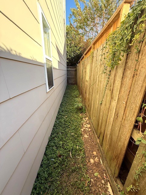 4243 Purdue Street, Unit C Houston, TX 77005 - Photo 47 of 48 a view of a pathway both side of house