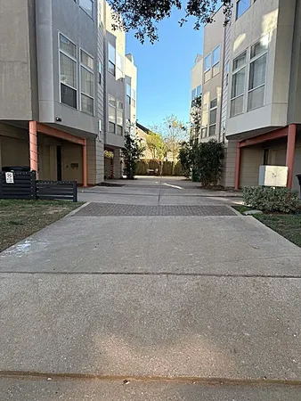 a view of a building with a street