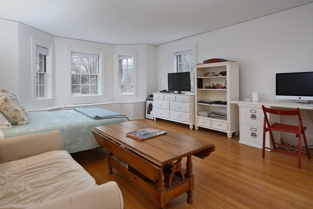 20 Malia Terrace Newton, MA 02467 - Photo 13 of 21 a living room with furniture and a flat screen tv