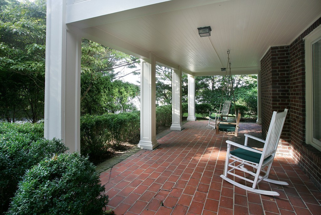 20 Malia Terrace Newton, MA 02467 - Photo 16 of 21 a building outdoor space with patio furniture and potted plants