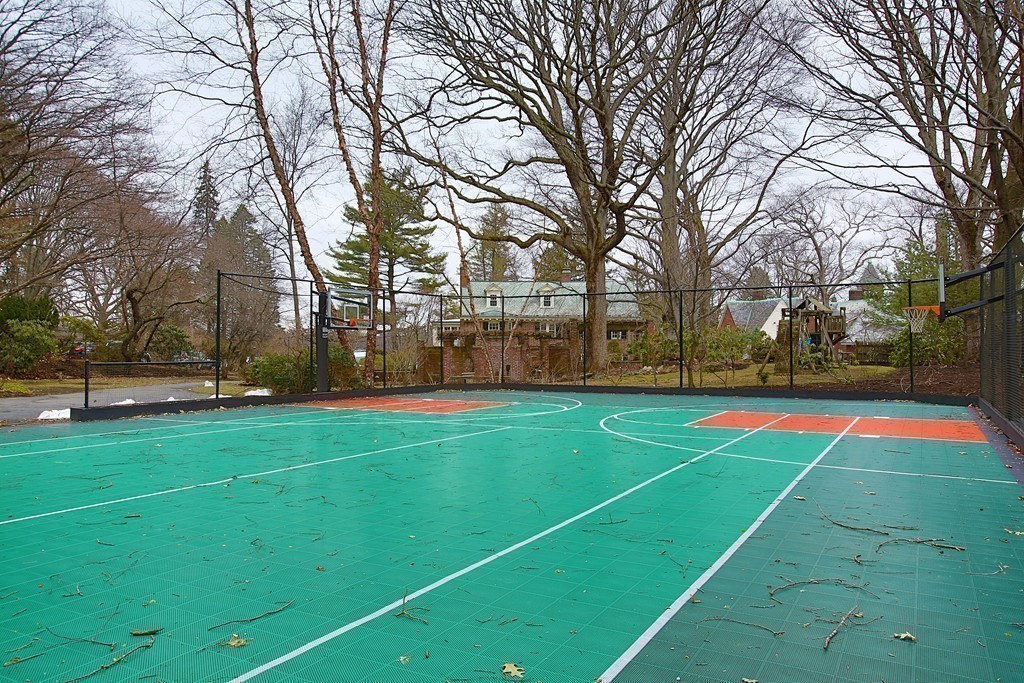 20 Malia Terrace Newton, MA 02467 - Photo 17 of 21 a view of a tennis ground with large trees