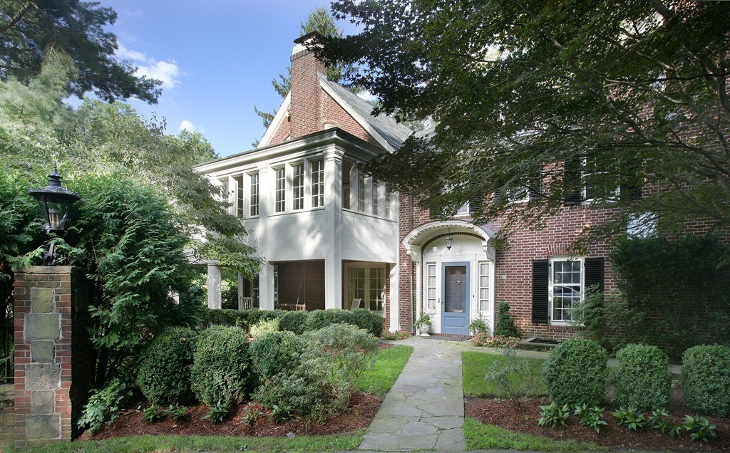 20 Malia Terrace Newton, MA 02467 - Photo 21 of 21 front view of a house with a garden