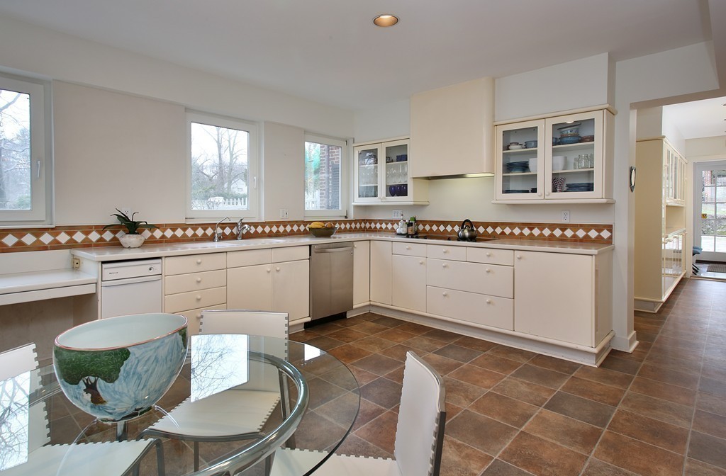 20 Malia Terrace Newton, MA 02467 - Photo 8 of 21 a kitchen with stainless steel appliances granite countertop a sink and cabinets