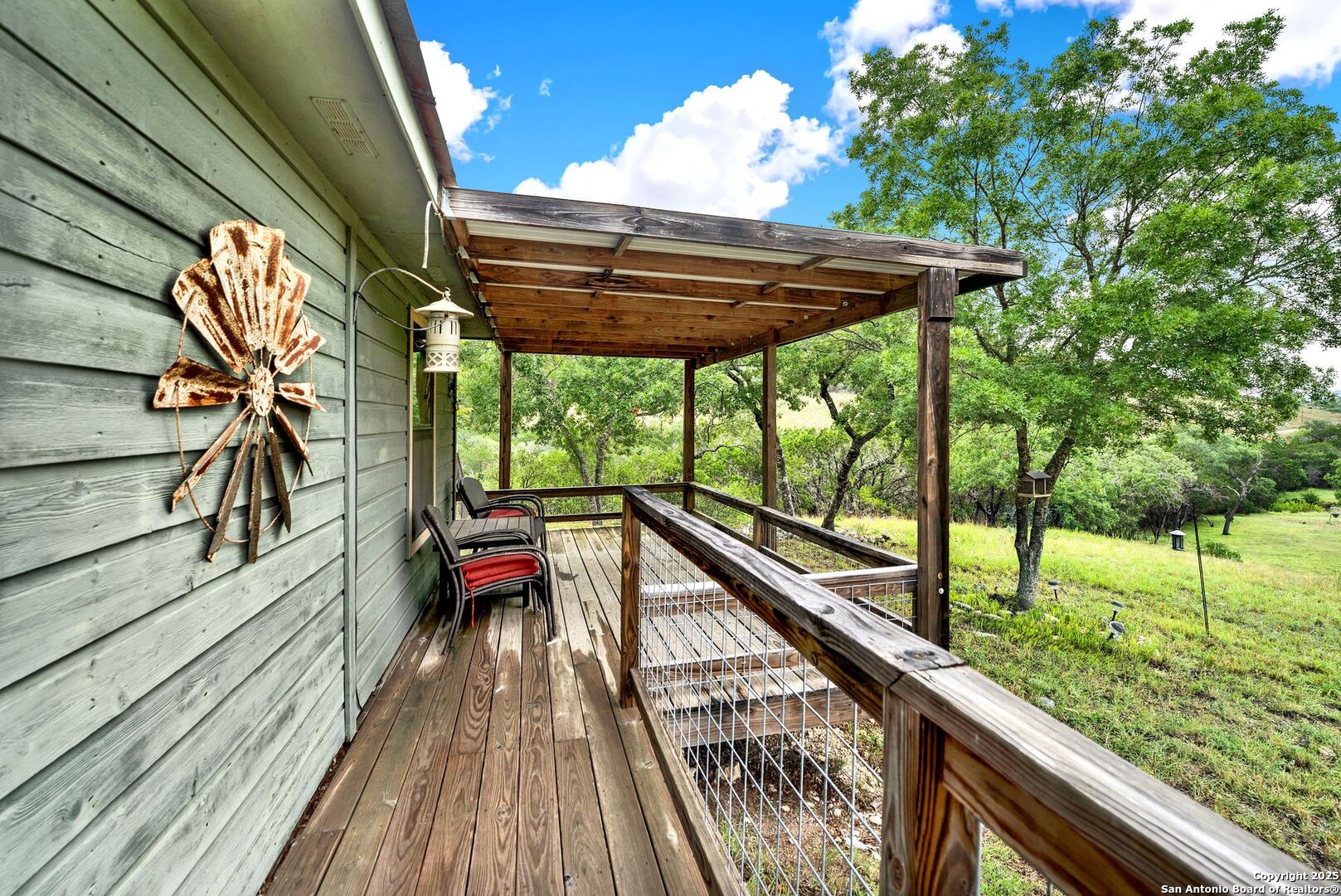 3695 Rio Hondo Road Tarpley, TX 78883 - Photo 13 of 47 a view of deck with furniture and garden