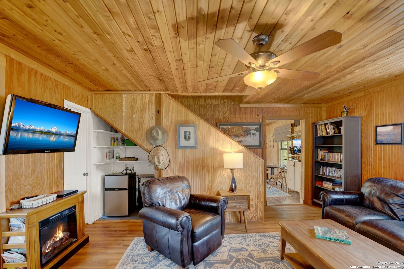 3695 Rio Hondo Road Tarpley, TX 78883 - Photo 20 of 47 a living room with furniture and a fireplace