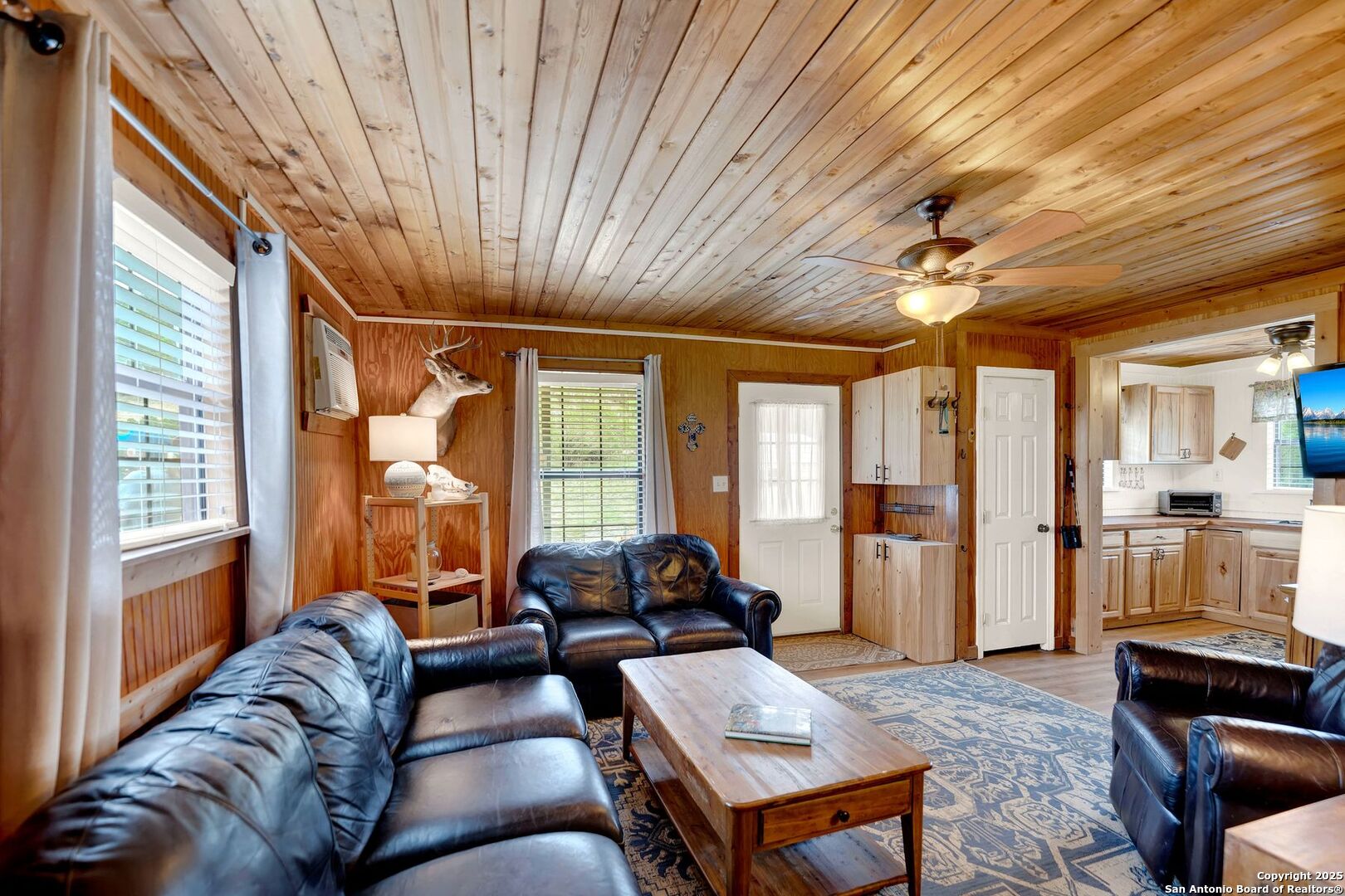 3695 Rio Hondo Road Tarpley, TX 78883 - Photo 22 of 47 a living room with furniture a ceiling fan and a window