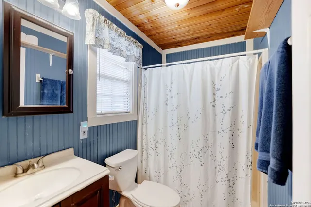 a bathroom with a sink and a toilet