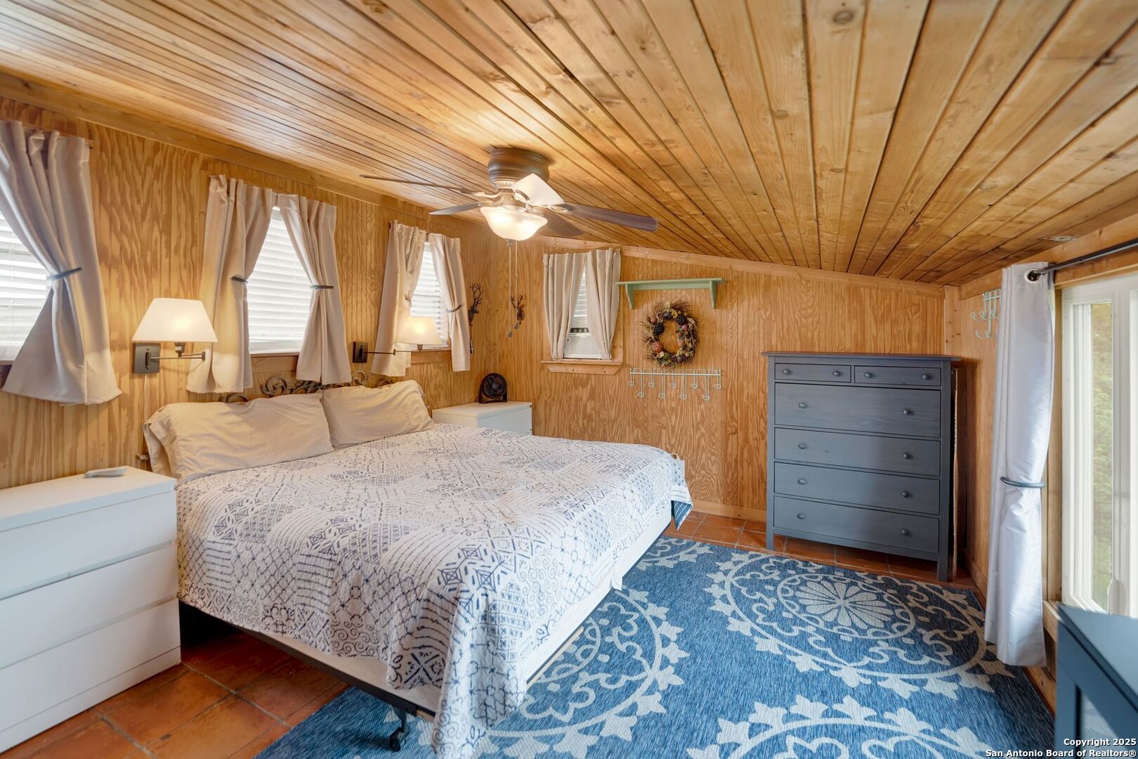 3695 Rio Hondo Road Tarpley, TX 78883 - Photo 27 of 47 a spacious bedroom with a bed and a window