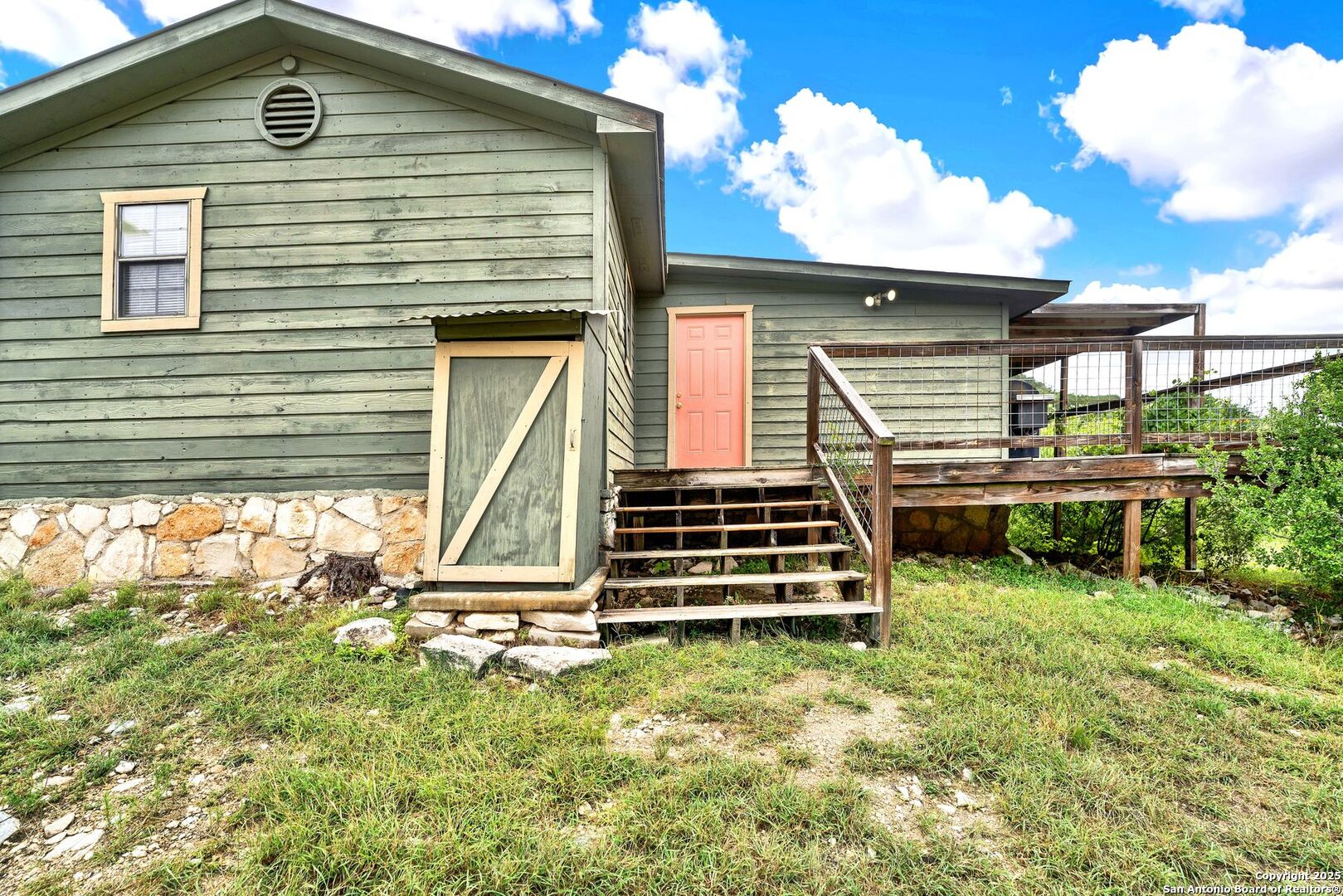 3695 Rio Hondo Road Tarpley, TX 78883 - Photo 32 of 47 a front view of a house with a yard