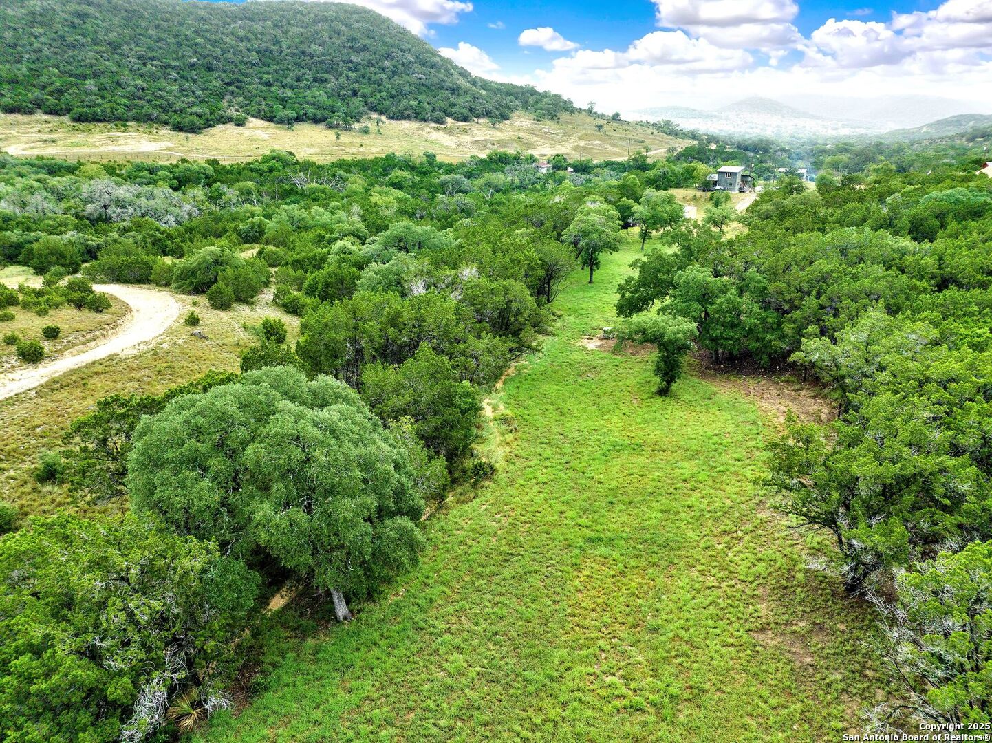 3695 Rio Hondo Road Tarpley, TX 78883 - Photo 37 of 47 a view of an outdoor space and a yard